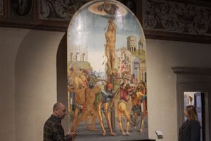 ​Francesca e Stefano Lazzari titolari della Bottega Tifernate e l'opera «Martirio di San Sebastiano» custodita nella Pinacoteca di Citta di Castello.